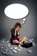 Young desperate girl writing with an old typewriter. Conceptual