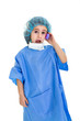 young doctor in surgeon uniform speaks on a phone