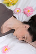 woman in depression lying in her bed