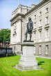 Edmund Burke in front of the Trinity College, Dublin - Ireland Edmund Burke in front of the Trinity College, Dublin - Ireland