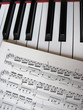 Piano keys with notes, musical background. Piano keys with notes, musical background.