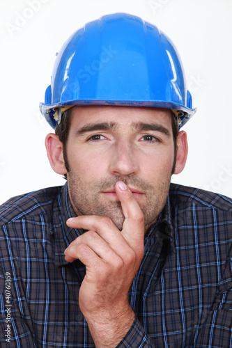 Photo: Closeup of a pensive man Closeup of a pensive man