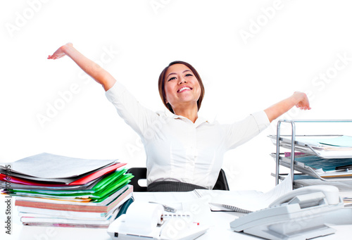 Foto: Young business woman relaxing. Young business woman relaxing.