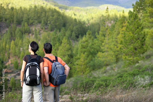 Photo: Couple hiking in the wilderness Couple hiking in the wilderness