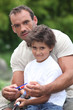 a father and his son fishing