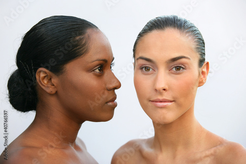Photo: African and Caucasian women African and Caucasian women