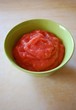 Jelly with strawberries in a green bowl Jelly with strawberries in a green bowl