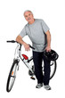 Photo: a mature man and a mountain bike a mature man and a mountain bike