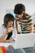 canvas print picture - Students using a laptop computer in a classroom
