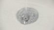 Pushing in the plug then turning on the tap. Pushing in the plug then turning on the tap.