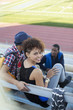 Students sitting together on bleachers
