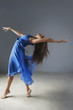 Dancer posing in ornate gown