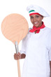 Smiling pizza chef