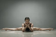 Ballet dancer posing in splits