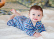 Baby in blue striped outfit