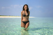 Beautiful sexy girl standing in lagoon (Maldives)