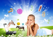 Smiling girl on green grass