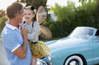 Father holding daughter in fairy wings