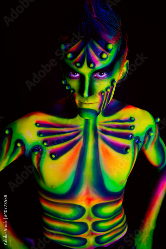Photo: Man with fluorescent bodyart Man with fluorescent bodyart