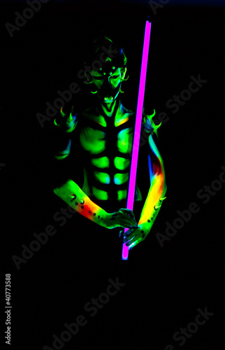 Photo: Man with fluorescent bodyart Man with fluorescent bodyart