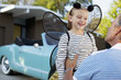 Father hugging daughter in fairy wings