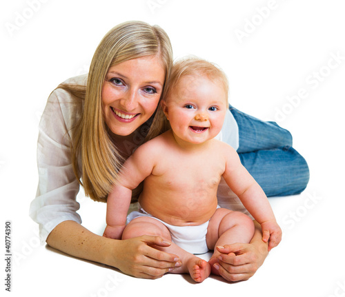 Photo: Mother holding cute infant girl isolated on white Mother holding cute infant girl isolated on white