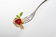 fork with macaroni and tomato