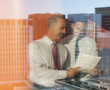 Businessmen working together in office