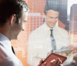 Businessman using tablet computer in office