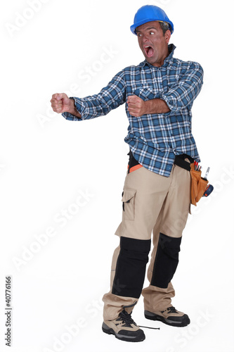 Photo: A deranged construction worker A deranged construction worker