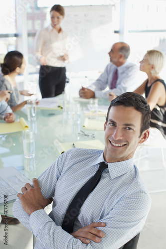 Photo: Businessman sitting in meeting Businessman sitting in meeting