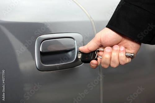 Photo: Closeup of a key in a car door Closeup of a key in a car door
