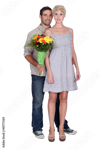Photo: Couple with a bunch of flowers Couple with a bunch of flowers