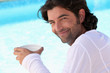 Brown-haired man with bowl