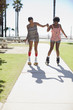Women skating together outdoors