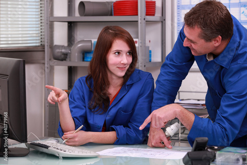 Photo: Boss and employee in office Boss and employee in office