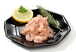 Pile of shrimps over a black dish Pile of shrimps over a black dish