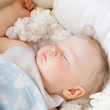 LIttle girl sleepping in bed (11 month)