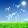House from white clouds against blue sky