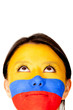 Colombian woman looking up