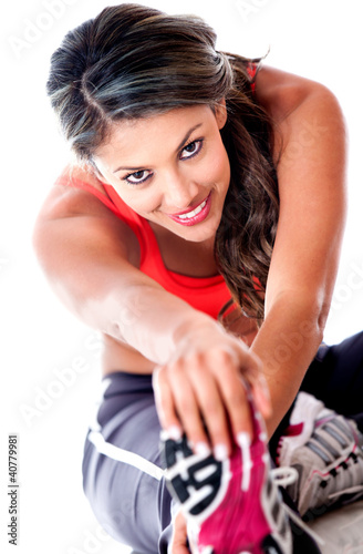 Foto: Fit woman stretching Fit woman stretching