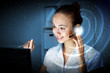 Young woman in business wear and headset