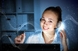Young woman in business wear and headset