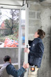 Workers installing new windows