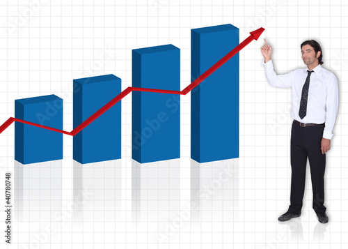 Photo: executive pointing at bar graph executive pointing at bar graph