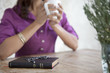 Prayer beads on Bible at breakfast table