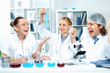Young scientists working in laboratory
