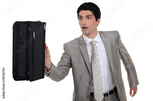 Photo: Man running with briefcase Man running with briefcase