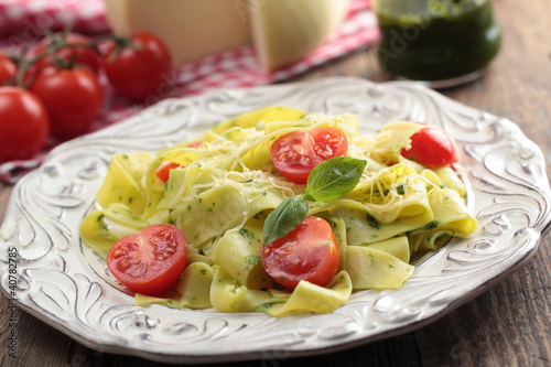 Photo: Pasta with pesto and tomato Pasta with pesto and tomato