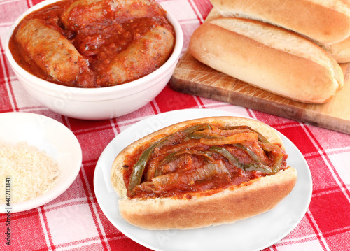 Photo: Sausage sub with peppers, onions and tomato sauce. Sausage sub with peppers, onions and tomato sauce.